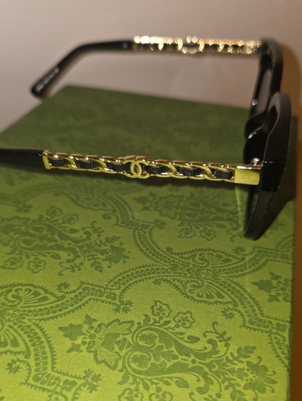 CHANEL Black Sunglasses with Gold Chain-Detail Temples